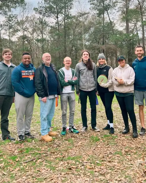 Team outing at disc golf park (group)