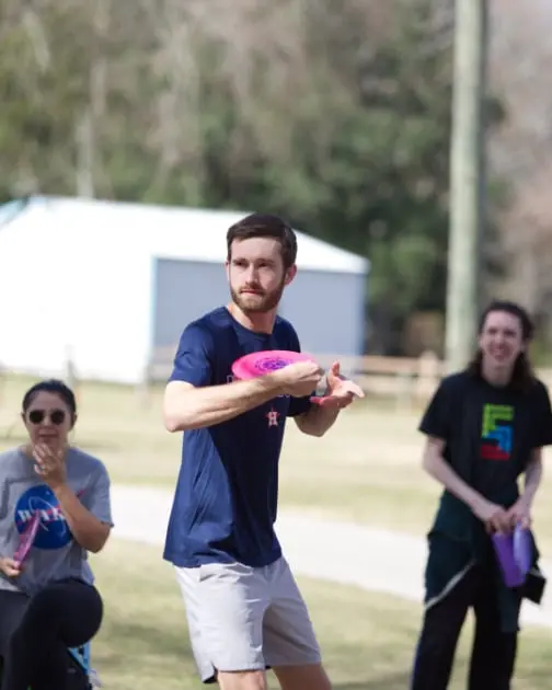 Team outing at disc golf park (candid)